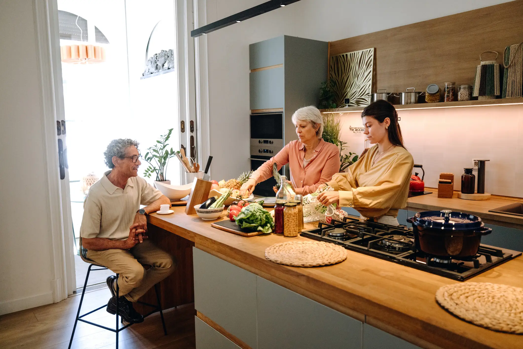 Family cooking together in the kitchen